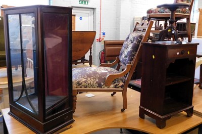 Lot 1540 - A group of furniture, to include a glass...
