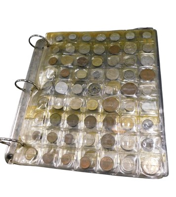 Lot 804 - An album containing a quantity of world coins.