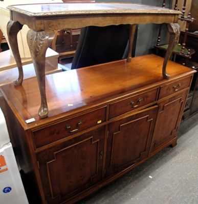 Lot 1543 - A mahogany sideboard, with three drawers over...