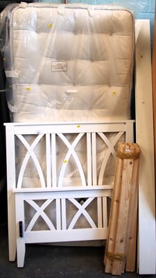 Lot 1550 - A white painted lattice work single bed frame,...