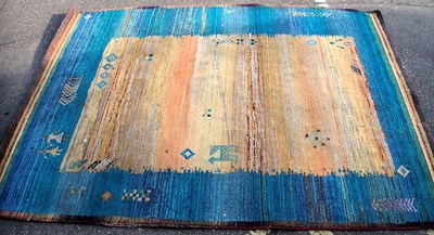 Lot 1577 - A modern rug, with linear geometric patterns,...