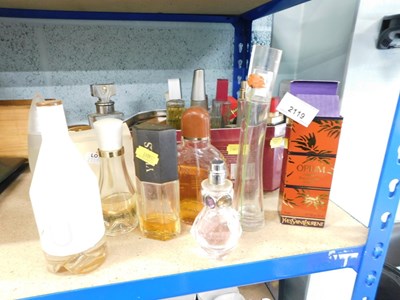 Lot 2119 - A bottle of Yves St Laurent Opium, partial...