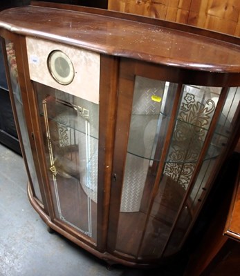 Lot 1591 - A walnut veneer 20thC bow fronted glazed two...