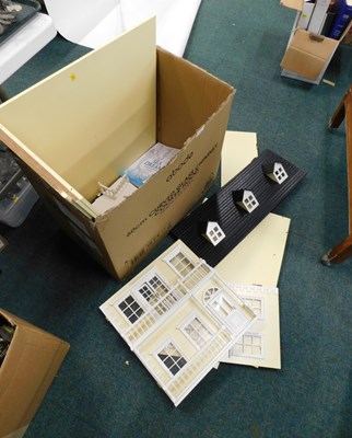 Lot 2202 - A doll's house, unassembled.