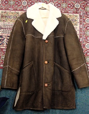 Lot 2222 - A three quarter length sheepskin coat, in...