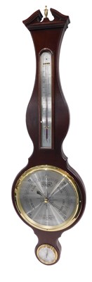 Lot 580 - A Comitti of London wheel barometer,...