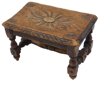 Lot 605 - A late 19thC small oak stool, with carved top...