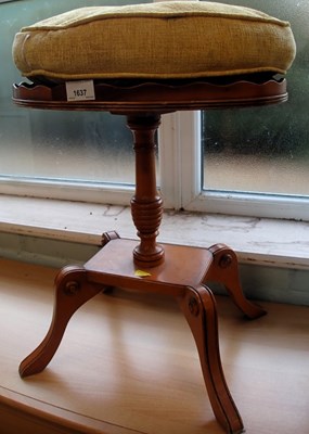 Lot 1637 - A wine table, with a turned column, on four...