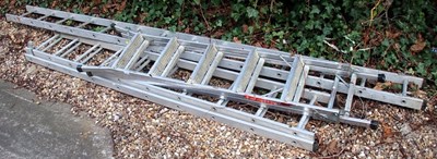 Lot 1639 - An aluminium step ladder, with splayed feet,...