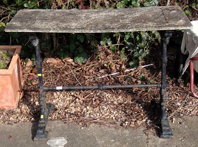 Lot 1641 - A cast iron framed garden table, with stone...