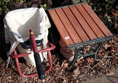 Lot 1643 - A garden trolley, a quantity of plant pots,...