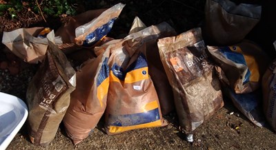 Lot 1649 - A large quantity of bags of builders sand.