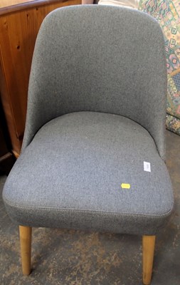 Lot 1658 - A grey upholstered Oak Furniture Land chair,...
