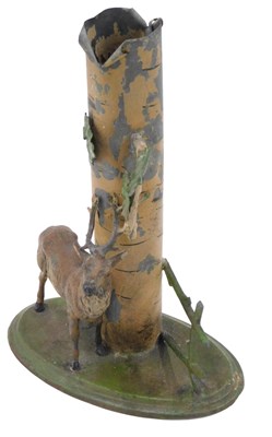 Lot 621 - A painted tin spill vase, modelled with a stag...