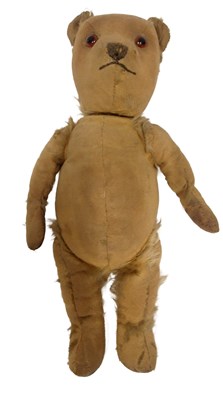Lot 625 - An early 19thC plush teddy bear, 35cm long. (AF)