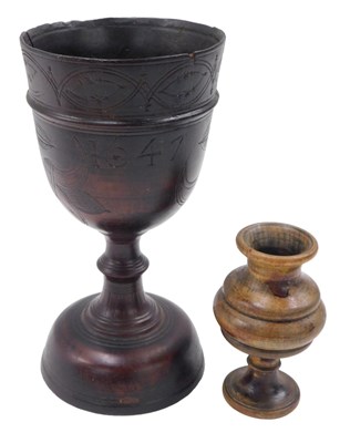Lot 626 - A turned treen challis or cup, decorated with...