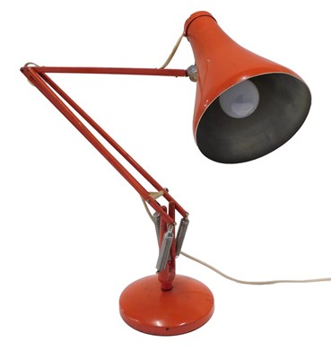 Lot 664 - An orange painted Anglepoise lamp, on domed foot.