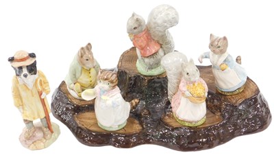 Lot 488 - A collection of Beatrix Potter figures, to...