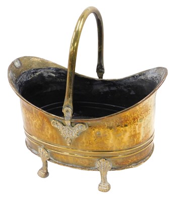 Lot 663 - A hammered brass coal scuttle, with hinged...