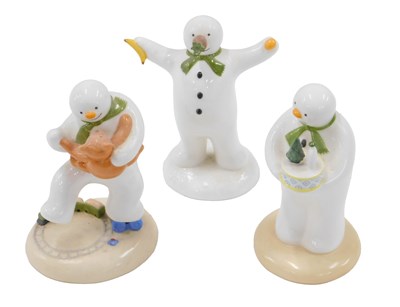 Lot 492 - Three Coalport Snowman figures, Snowman...