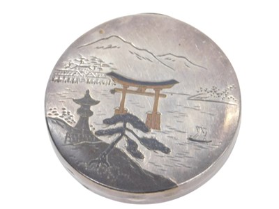 Lot 855 - A Japanese Asahi silver compact, of circular...