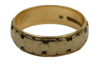 Lot 82 - A 9ct bicolour gold wedding band, size P, 4.0g.