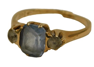 Lot 80 - An aquamarine and CZ three stone ring, with a...