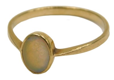 Lot 83 - An opal solitaire ring, the oval opal in a...
