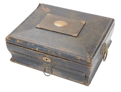 Lot 999 - A 19thC leather workbox, the lid with circular...