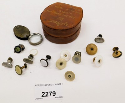 Lot 2279 - A group of Harlequin collar studs, eye glass,...