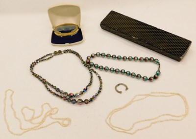 Lot 2286 - A seed pearl necklace, together with a gold...