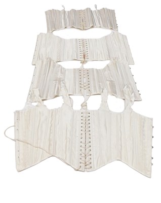 Lot 944 - Three Sinful Desires boned corsets, and another.