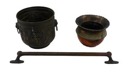 Lot 960 - A 20thC embossed metal twin handled jardiniere,...