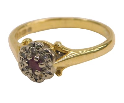 Lot 99 - An 18ct gold ruby and diamond ring, in a...
