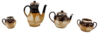 Lot 916 - A Doulton Lambeth stoneware four piece tea set,...
