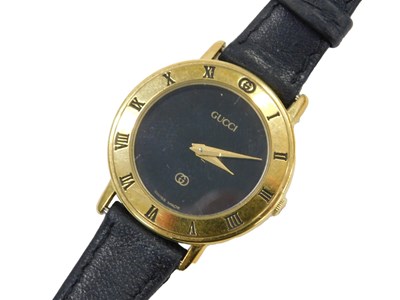 Lot 71 - A Gucci lady's gold plated...