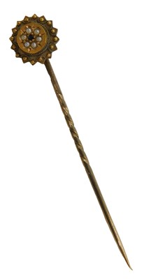Lot 66 - A Victorian sapphire and seed pearl tie pin,...