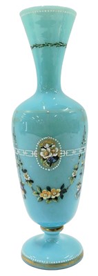 Lot 920 - A Victorian blue opaque glass vase, painted in...