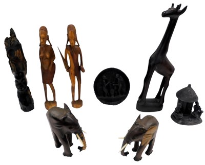 Lot 921 - Various tribal carvings, to include a Giraffe,...