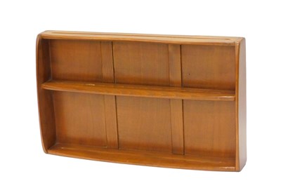 Lot 1097 - An Ercol elm two tier wall mounting plate rack,...