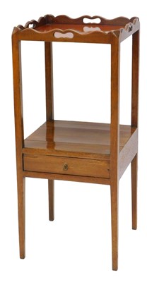 Lot 1101 - A 19thC mahogany whatnot, with a wavy gallery...