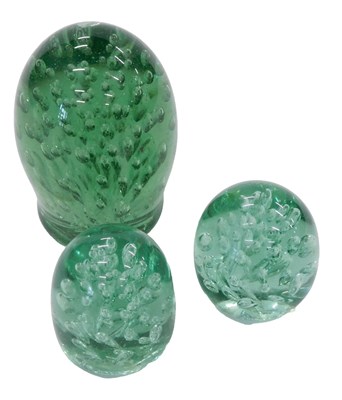Lot 991 - A 19thC glass dump, with bubble inclusions,...