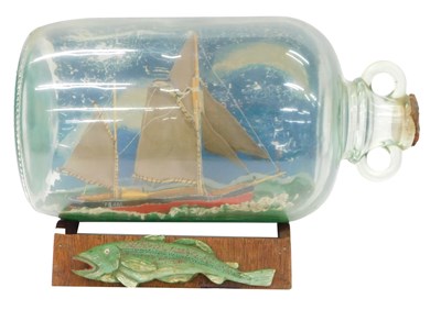 Lot 1018 - A scale model of a fishing vessel, in a glass...