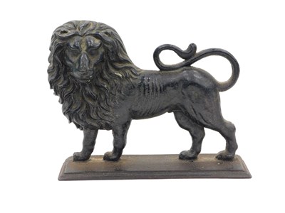 Lot 1023 - A Victorian cast iron door stop, modelled as a...
