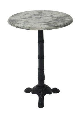 Lot 1111 - A marble and cast iron table, with circular...