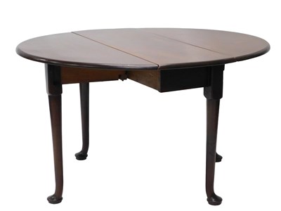 Lot 1120 - A mid 18thC mahogany drop leaf table, on...