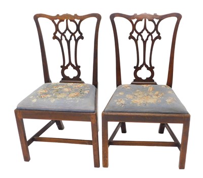 Lot 1123 - A pair of George III oak dining chairs, each...