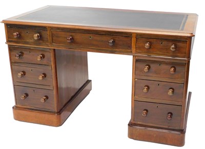Lot 1124 - A Victorian walnut pedestal desk, the top with...