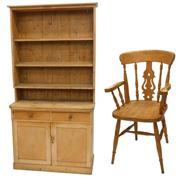 Lot 1130 - A late 19thC stripped pine dresser, the top...