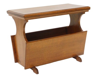 Lot 1192 - An oak magazine rack by David Langstaff "oak...